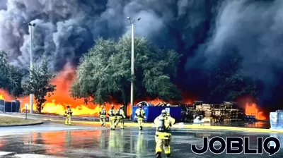 PHOTOS: ‘Sprawling’ 4-alarm blaze sparked by brush fire rips through Osceola County business